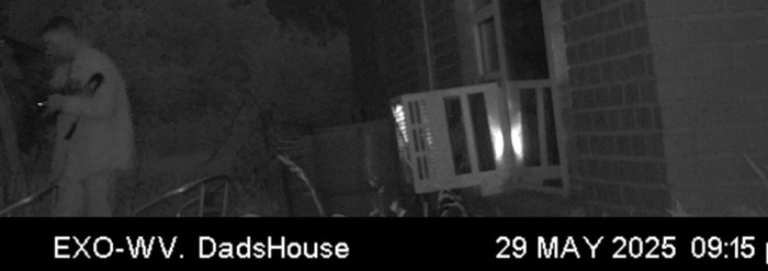 SuspectLeavingHouse700